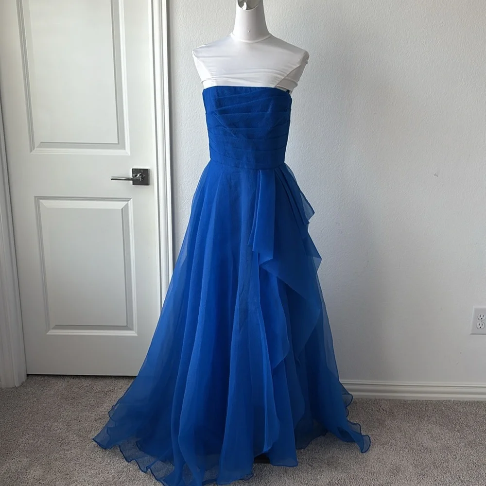 Theia Blue Asymmetrical Ruffled Strapless Gown - Picture 4 of 9
